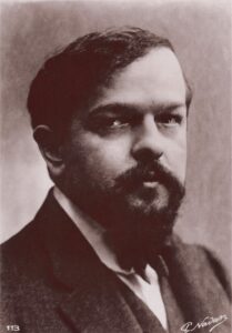 Nadar, Paul. Portrait de Claude Debussy, compositeur français. 1895. Photographie. Collection particulière.